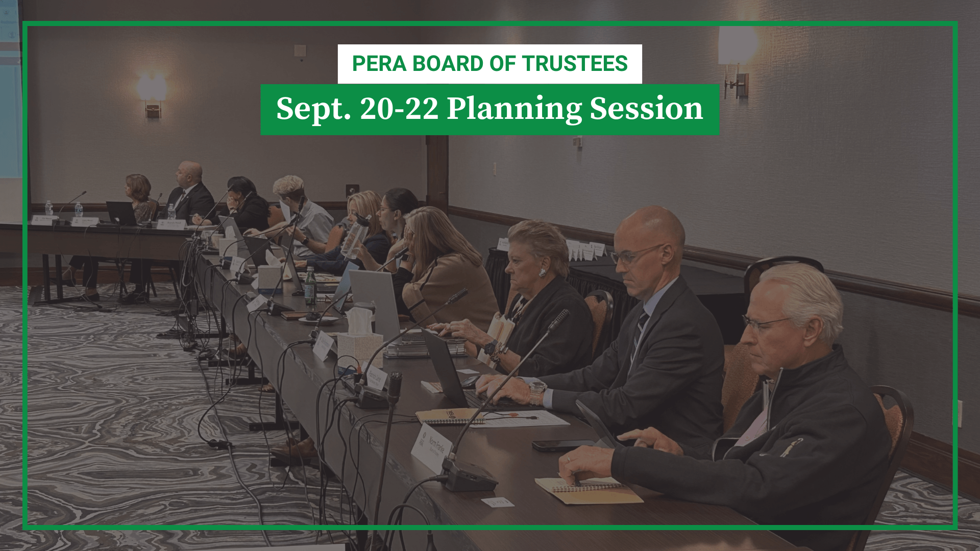 People sitting at a long table with laptops and documents during the PERA Board of Trustees planning session, held from September 20 to 22. A green label at the top indicates the event and date.