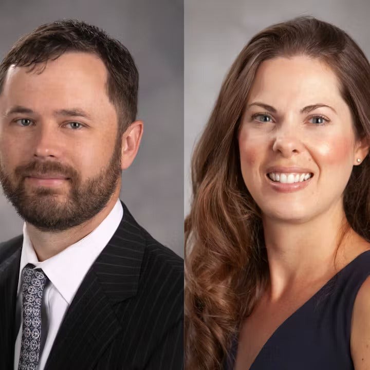 Professional headshots of a man and a woman against a gray backdrop.