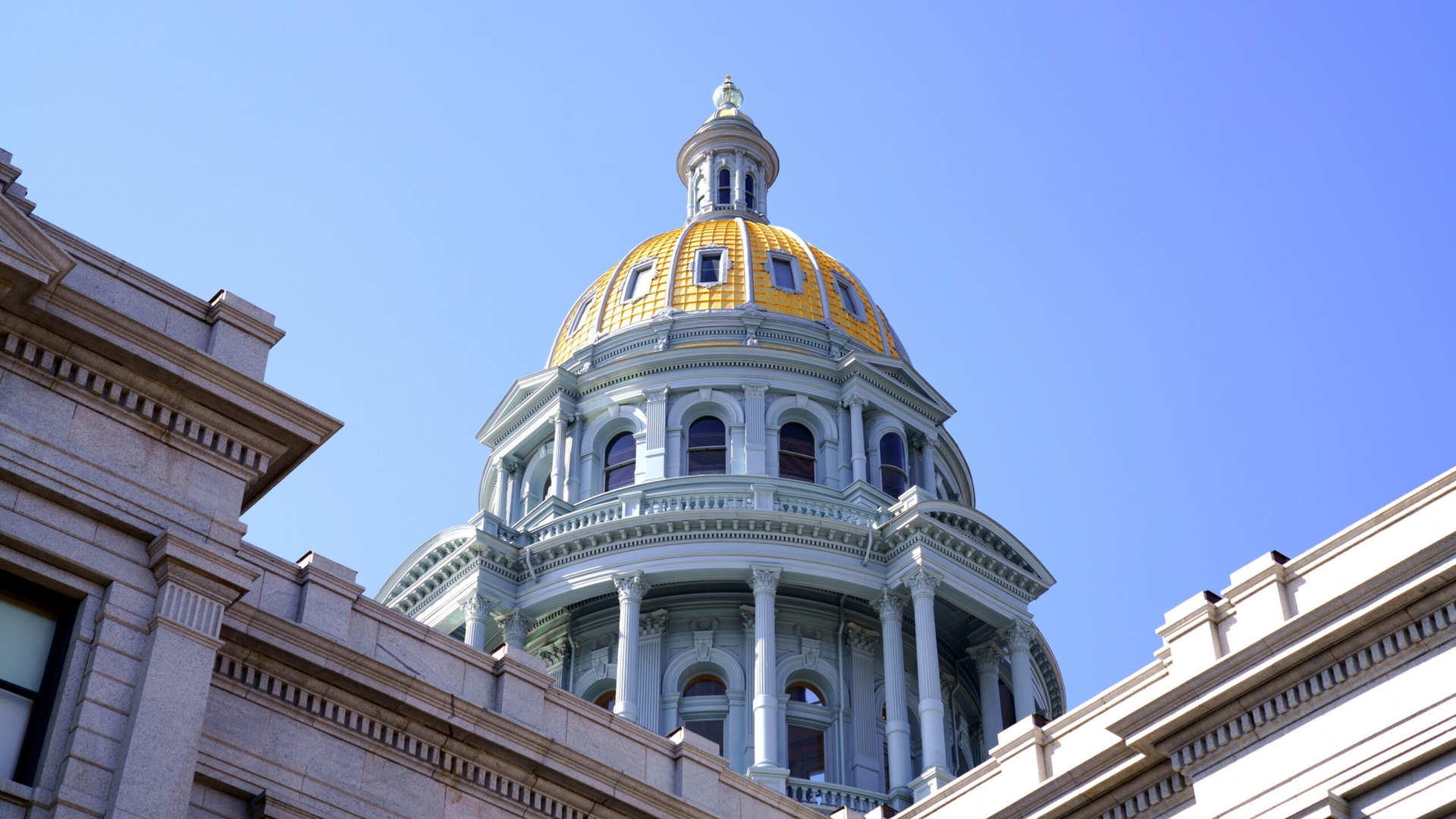 A view of the golden dome atop the Colorado State Capitol Building in Denver